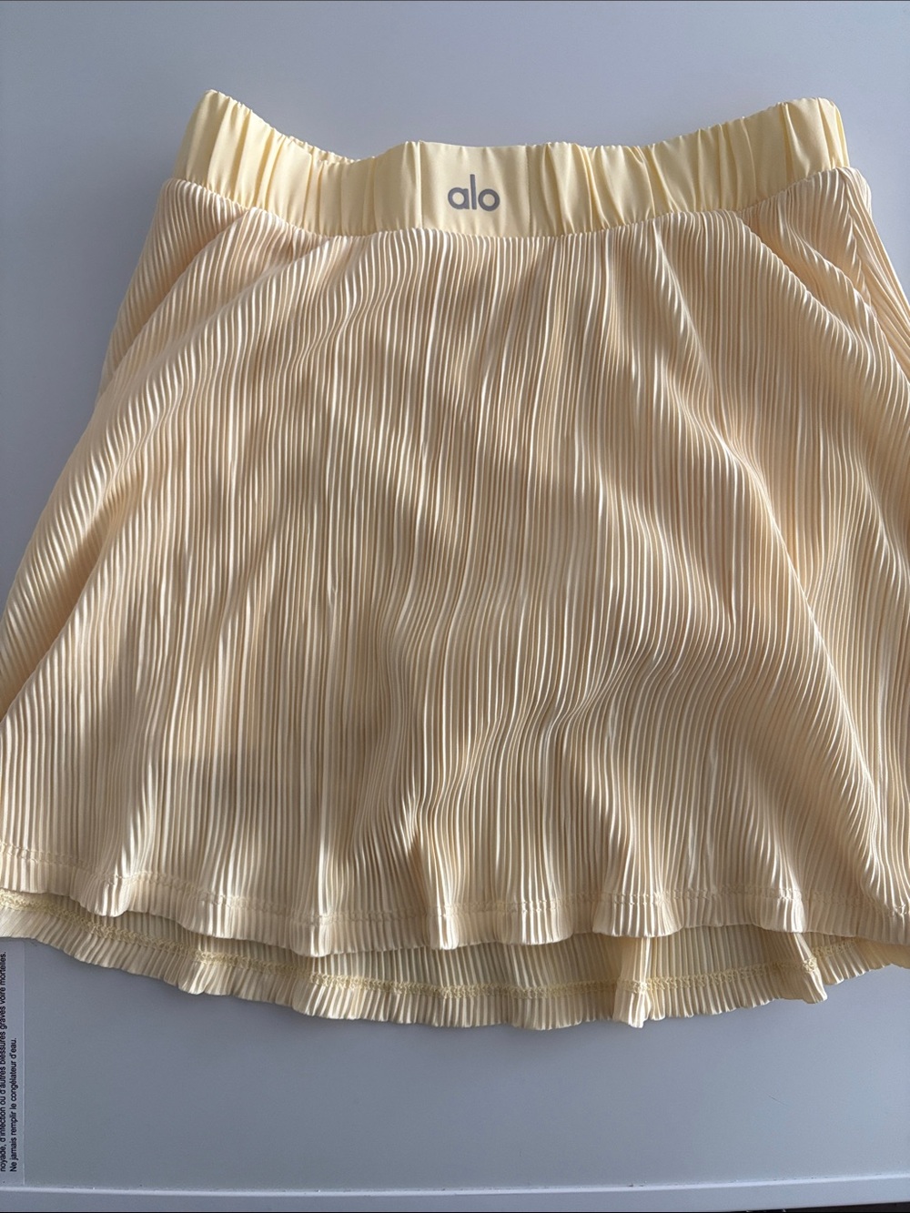 ALO Yoga Pleated Skater Skirt in Soft Yellow